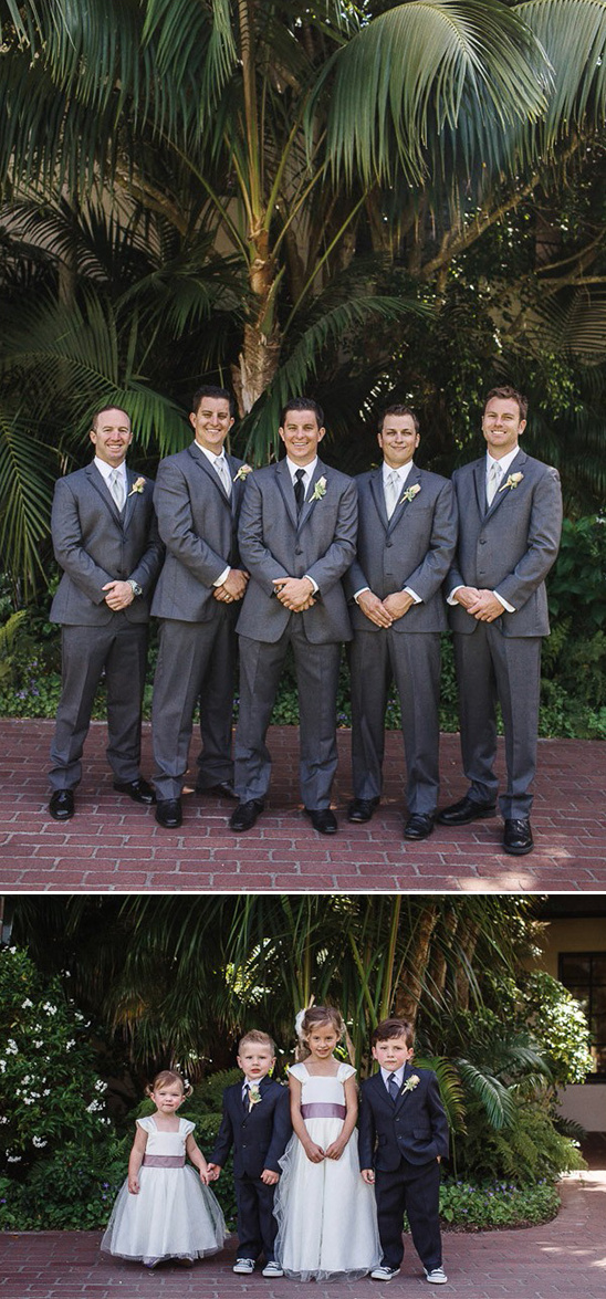 charcoal suit groomsmen purple sashed flower girls and suited up ring bearers