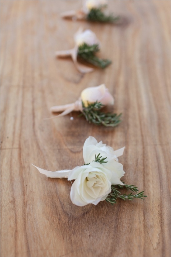 white and pink rose boutonnieres