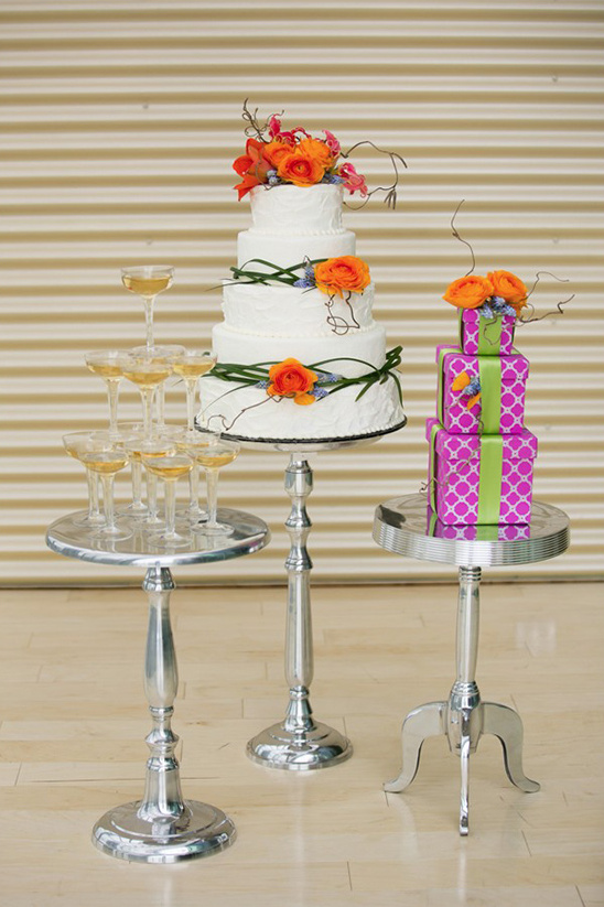 champagne tower with wedding cakes