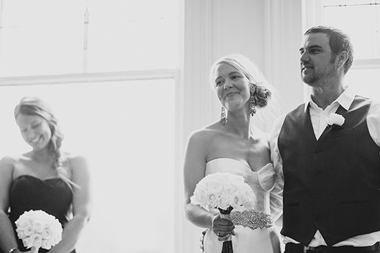 Bride and Groom with Bridesmaid at Wedding Ceremony