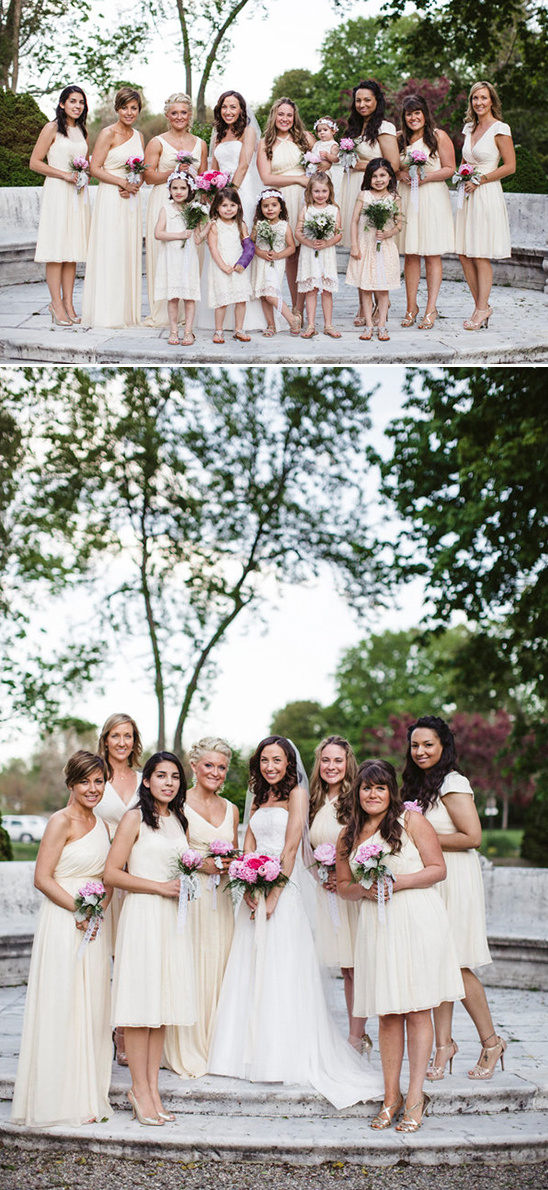 Bride and bridesmaids in ivory dresses with pink bouquets