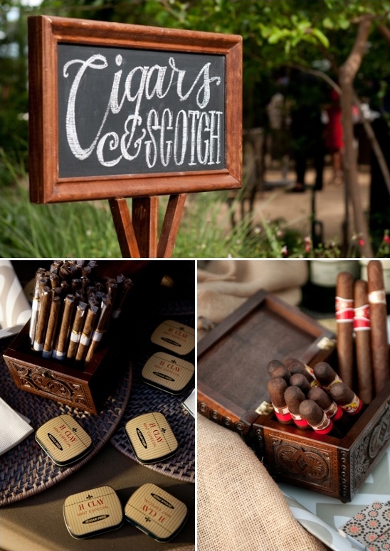 Cigars and scotch sign and wooden boxes at wedding