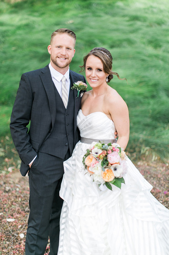 Happy bride and groom on their wedding day outdoors