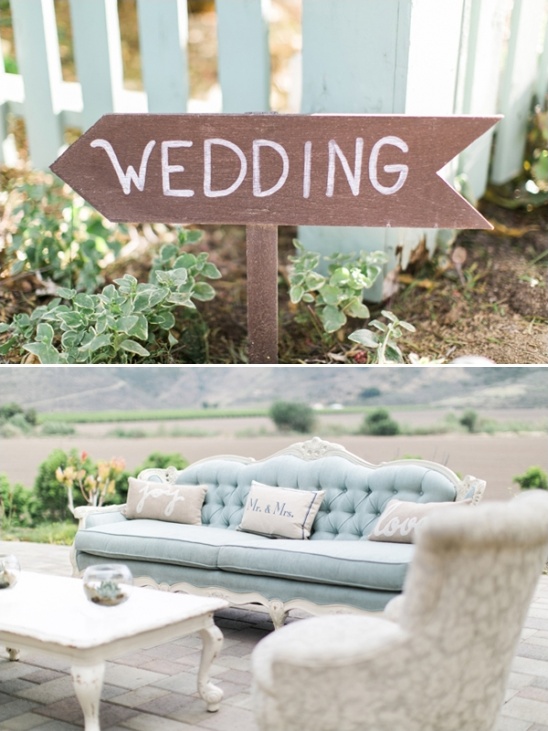 Wedding sign and outdoor seating for a wedding reception