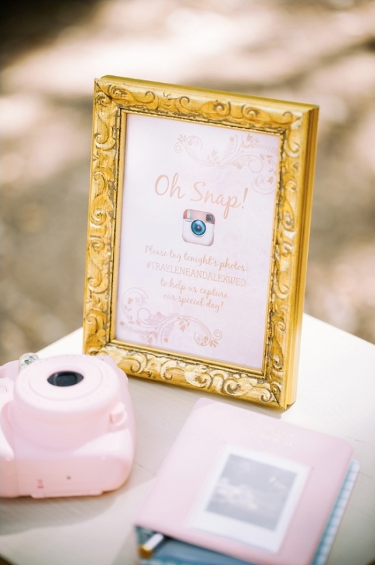 oh snap instagram sign and pink polaroid camera for photobooth