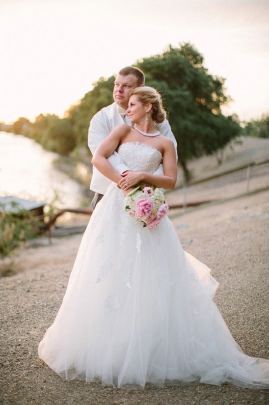 Happy bride and groom on their wedding day outdoors