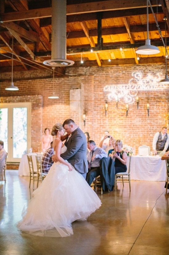 Romantic first dance of bride and groom at wedding
