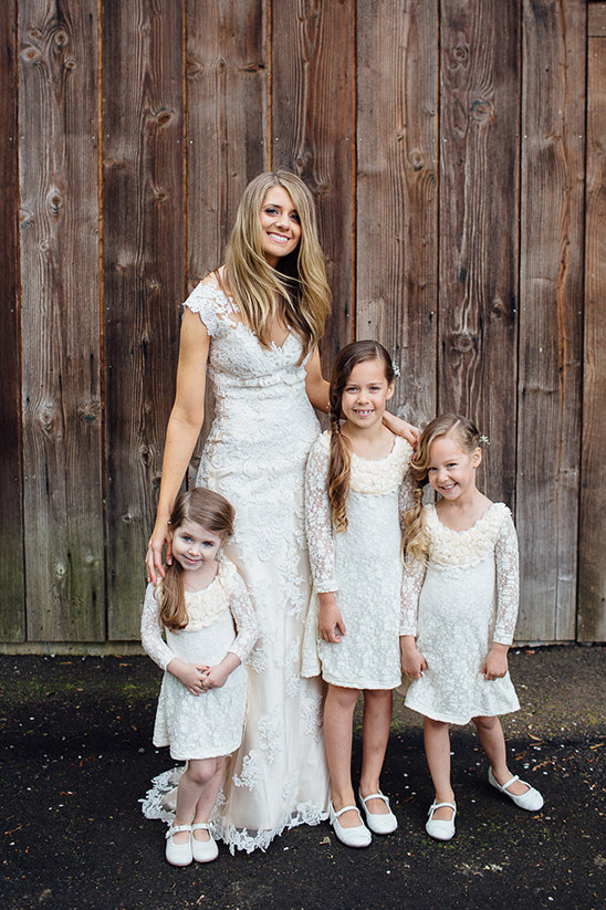 lace wedding gown with matching flower girl dresses