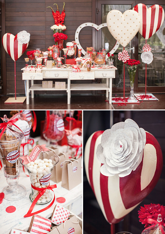 red and white heart covered dessert table