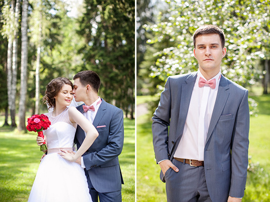 Happy wedding couple in park groom kisses bride and groom alone