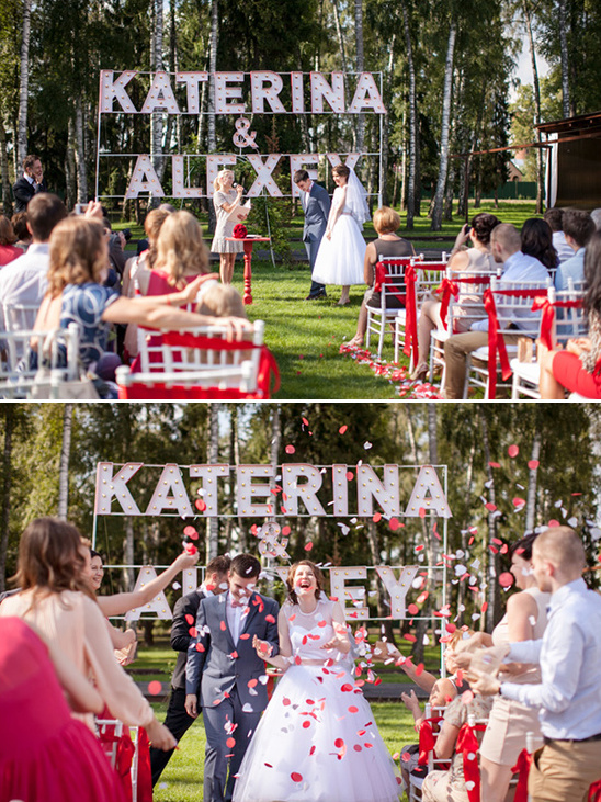 Bride and groom Katerina and Alexey joyful outdoor wedding confetti
