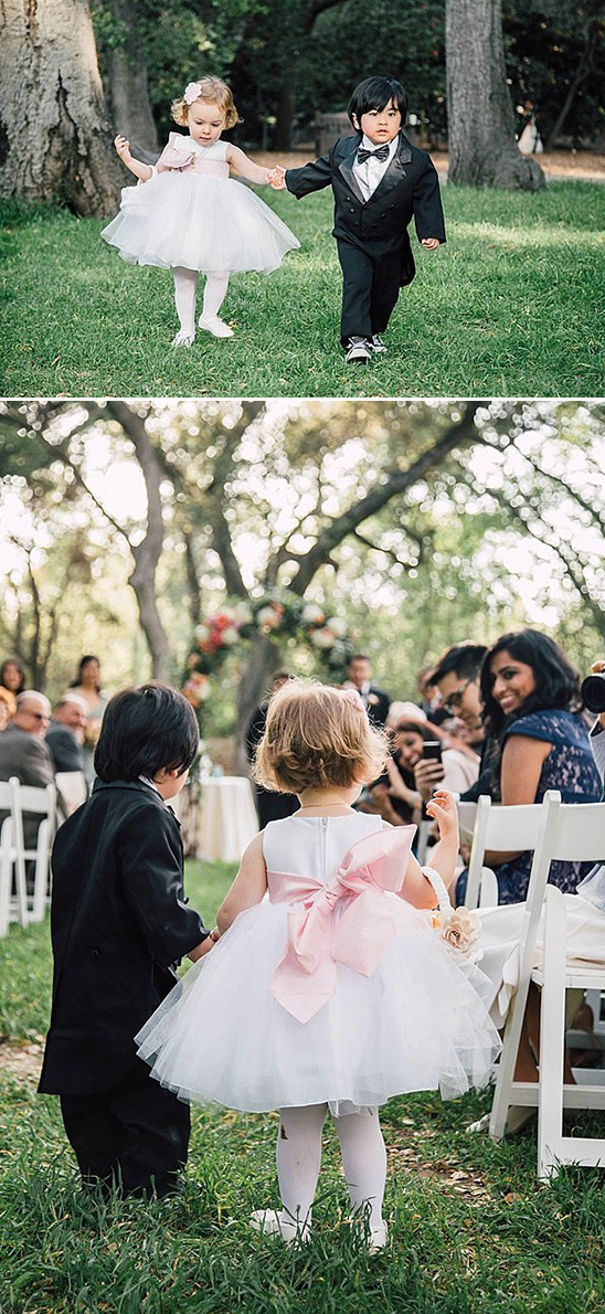 Flower girl and ring bearer at outdoor wedding