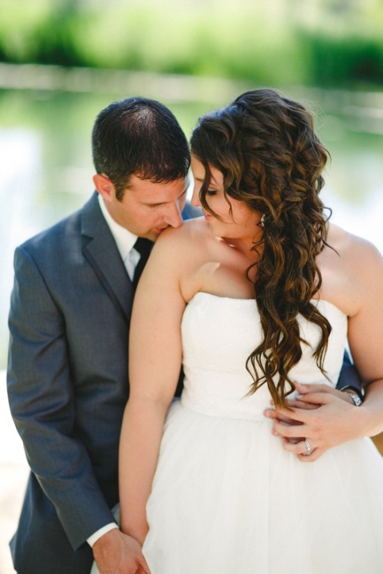 Bride and groom embracing on their wedding day