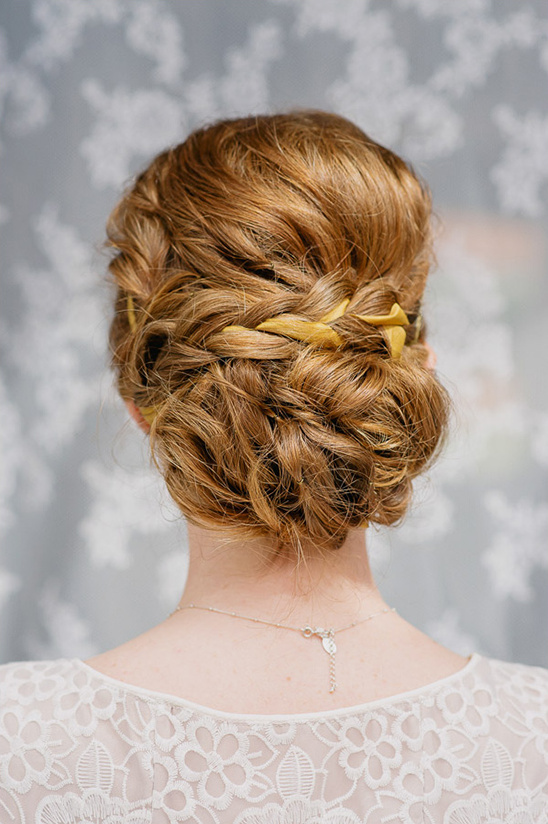 braided low bun wedding hair idea