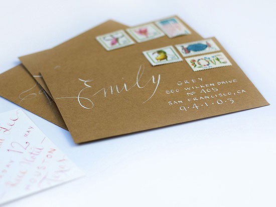 Hand addressed wedding invitation with vintage stamps