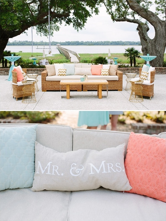 Outdoor wedding lounge area with Mr and Mrs pillows