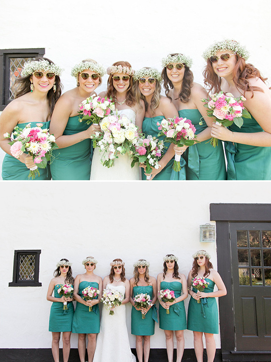 Bridesmaids with flower crowns and sunglasses posing for wedding photos