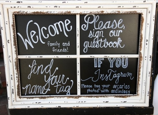 Wedding chalkboard sign with welcome and guestbook details