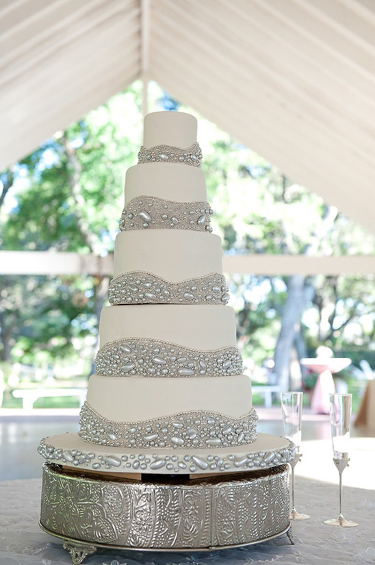 white and silver beaded wedding cake