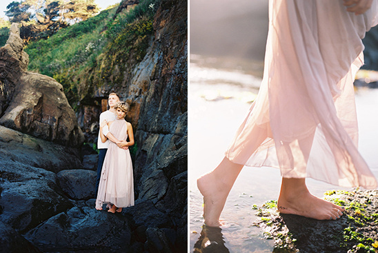 Romantic couple barefoot on beach with flowing dress