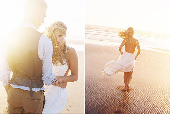 Couple embracing on sunny beach, woman in white dress