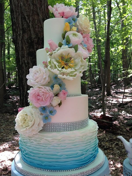 pastel floral covered wedding cake