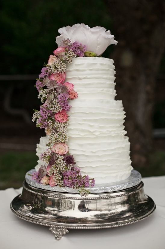 purple and pink floral ruffle wedding cake