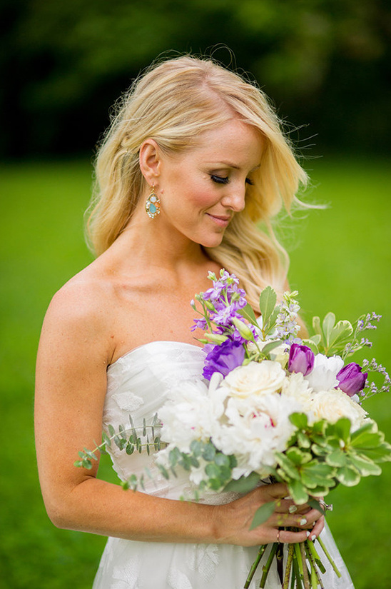 white wedding bouquet with pops of purple