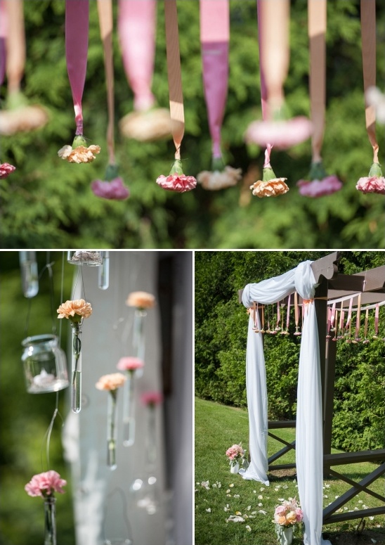 hanging flower bud decorated wedding arch