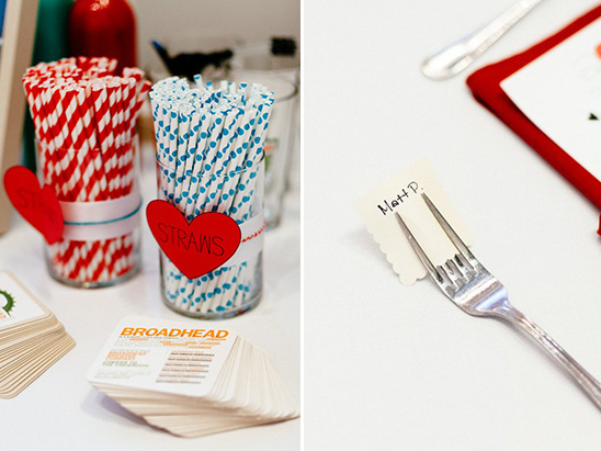 Stylish party setup with straws, cards, and place setting details