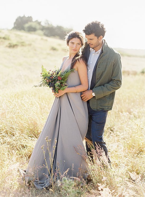 grey bridesmaid dress and wildflower bouquet