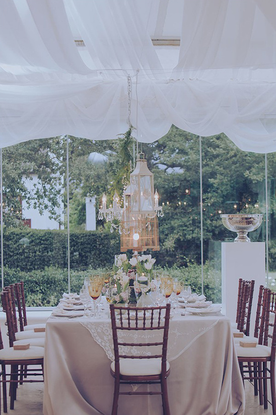 chandelier and lantern lit reception