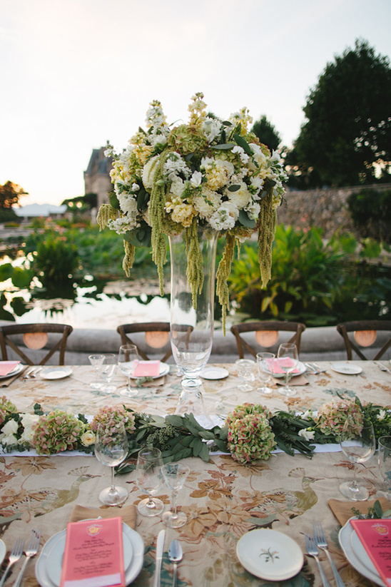 tall standing greenery and white bloom centerpiece