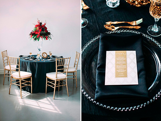 Elegant black and gold wedding table setting with menu
