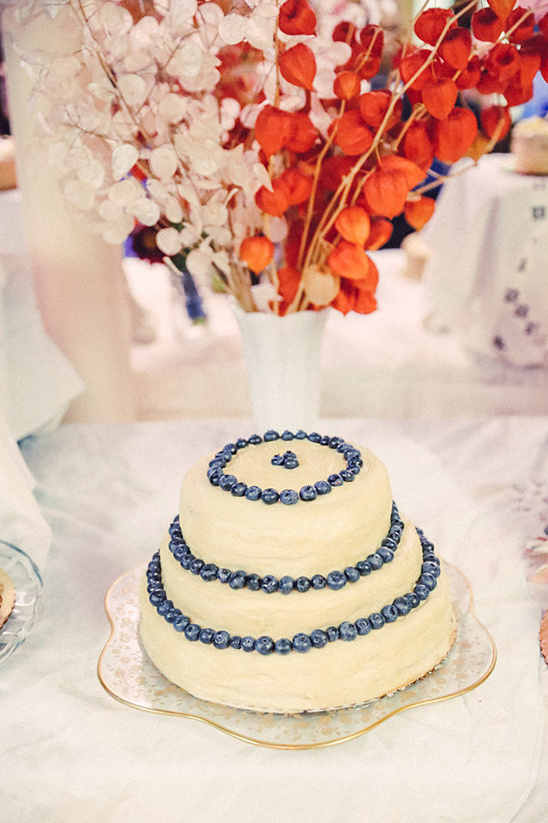 Three-tiered blueberry cake, elegant wedding dessert