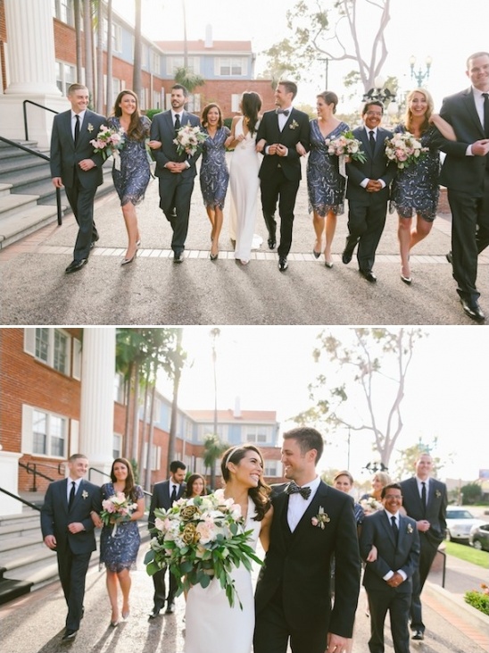 Happy bride and groom with wedding party