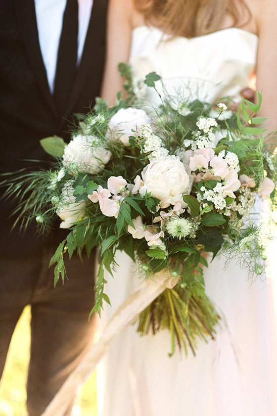 Elegant bridal bouquet of white flowers at a wedding