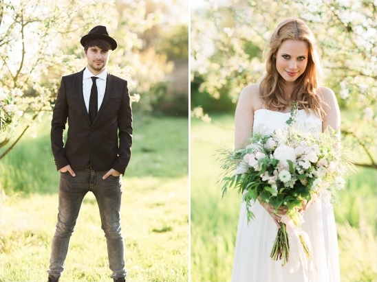 Bride and groom on wedding day with beautiful flowers and a smile