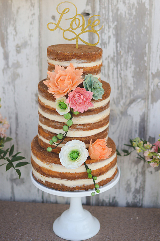 naked cake with love cake topper