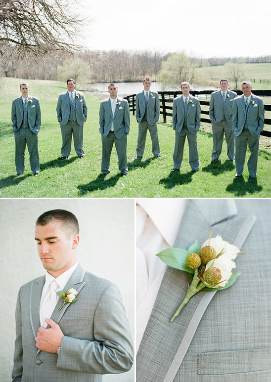 Groomsmen in stylish grey suits on a sunny wedding day