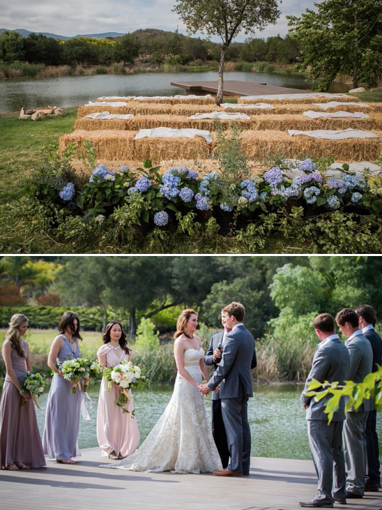 Outdoor wedding ceremony with lake, flowers, and hay bale seating