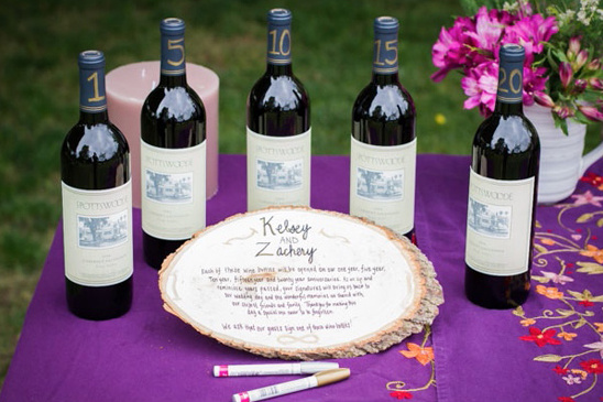 Wedding wine bottles with anniversary dates on display