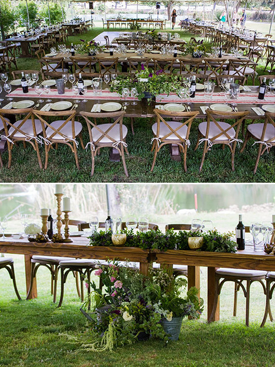 Outdoor wedding reception with wooden tables and floral decor