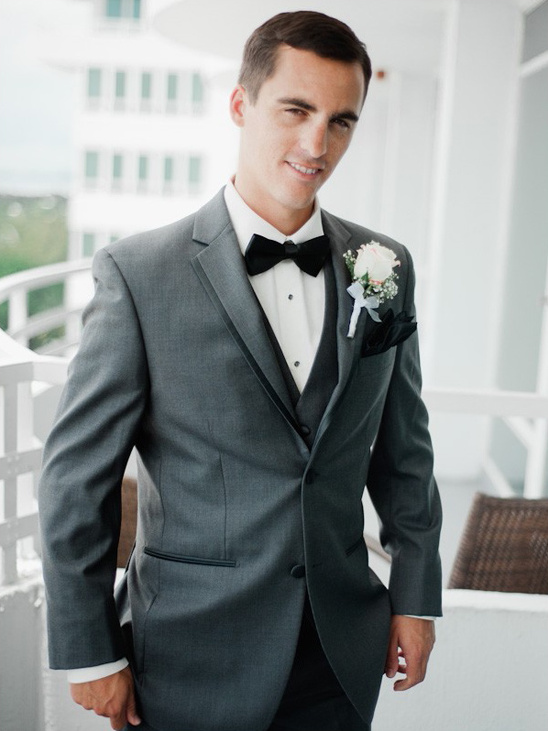 dapper three piece grey suit groom