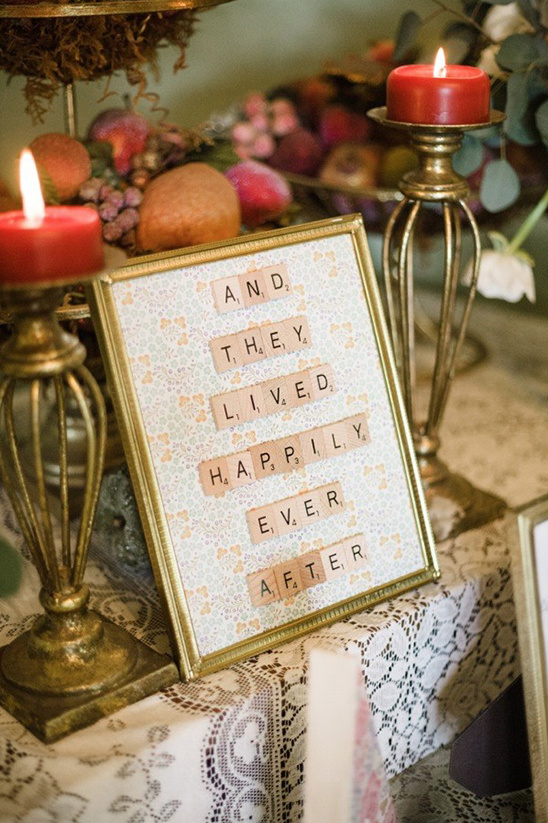 Romantic wedding decor with And they lived happily ever after sign