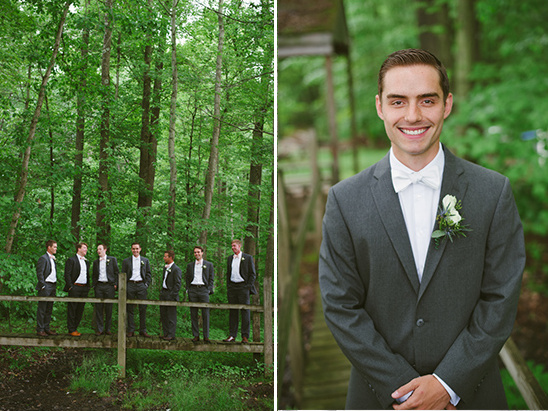 Wedding party in forest with groom smiling happily