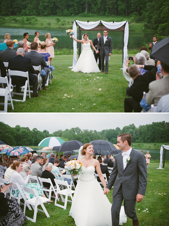 Newly married couple celebrates after wedding ceremony on grass