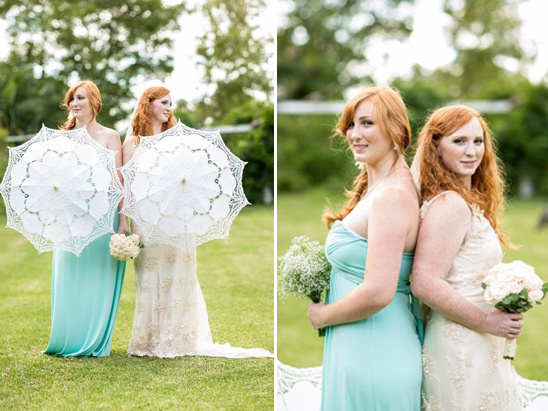 Redhead bridesmaids in mint dresses with lace parasols