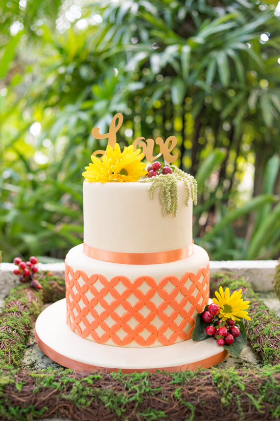 orange and white patterned wedding cake