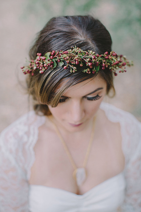 Bride wearing floral crown and quartz pendant necklace
